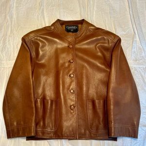 Vintage Chanel Boutique brown lambskin leather jacket with silk liner.